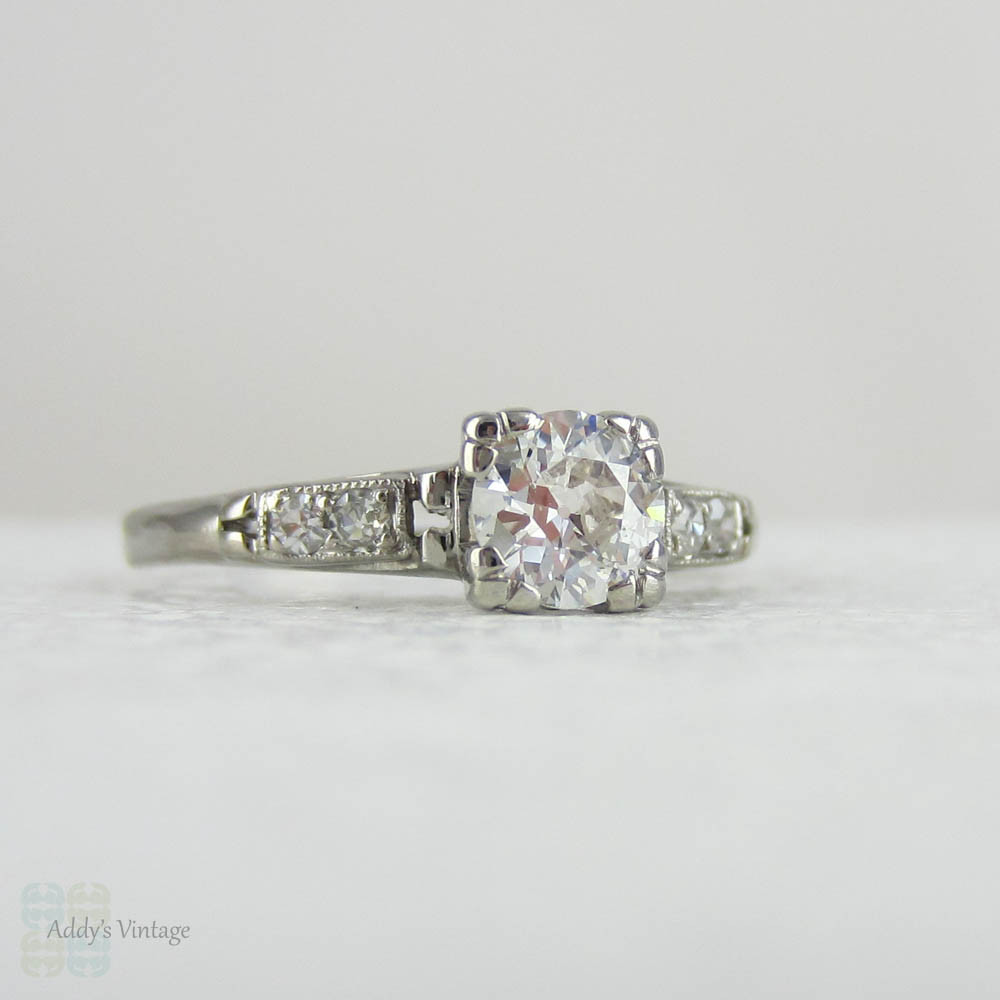 Antique Platinum Engagement Ring with European Cut Diamond in Triple Claw Fishtail Style Setting.Cathedral Setting, Circa 1920s.