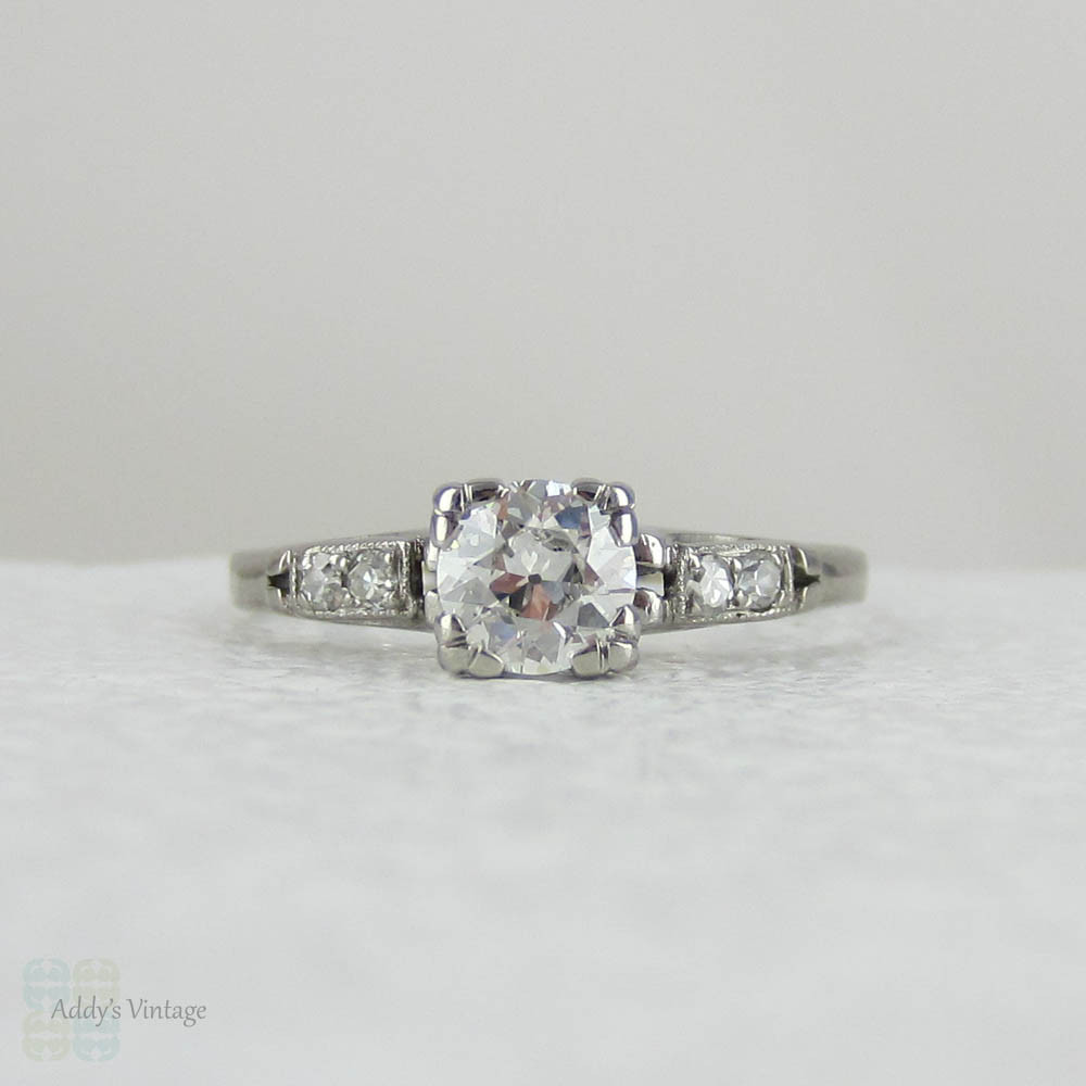 Antique Platinum Engagement Ring with European Cut Diamond in Triple Claw Fishtail Style Setting.Cathedral Setting, Circa 1920s.