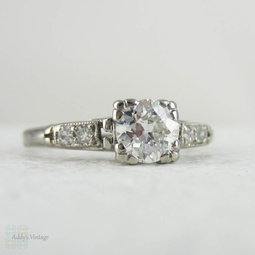 Antique Platinum Engagement Ring with European Cut Diamond in Triple Claw Fishtail Style Setting.Cathedral Setting, Circa 1920s.