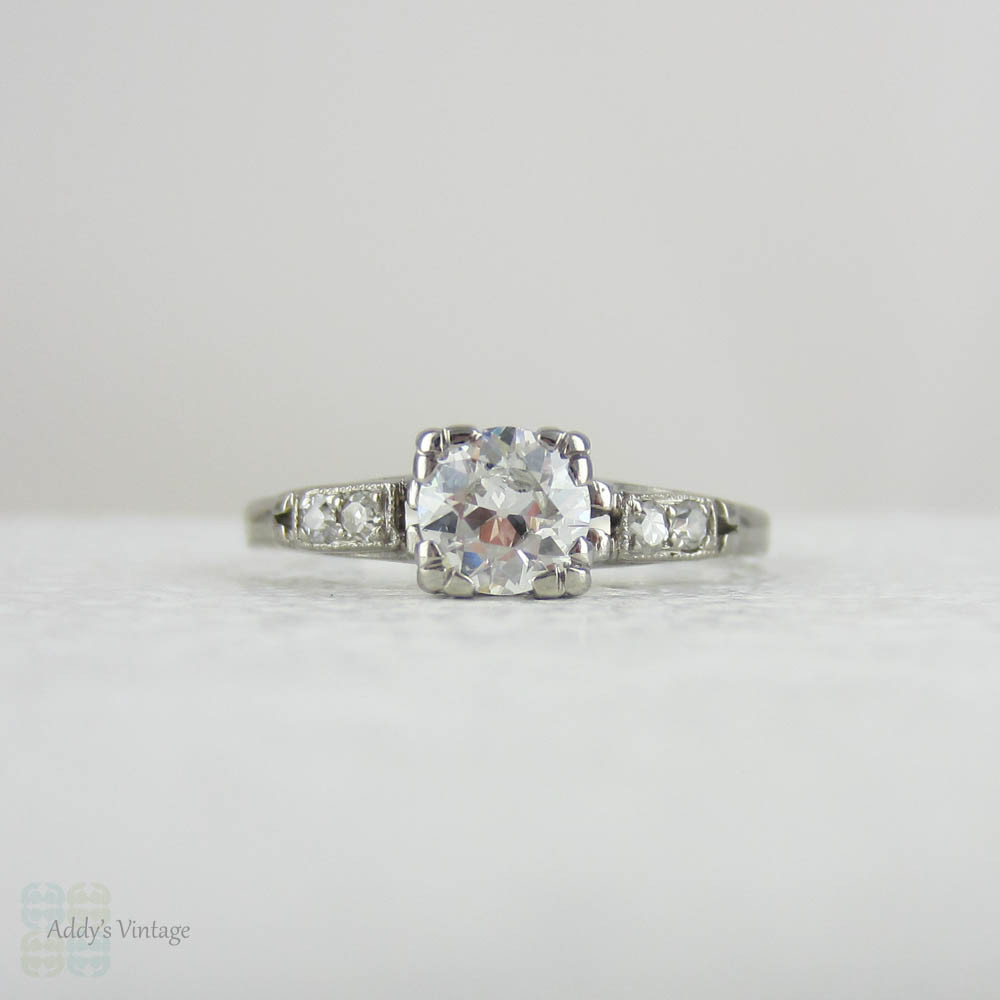Antique Platinum Engagement Ring with European Cut Diamond in Triple Claw Fishtail Style Setting.Cathedral Setting, Circa 1920s.