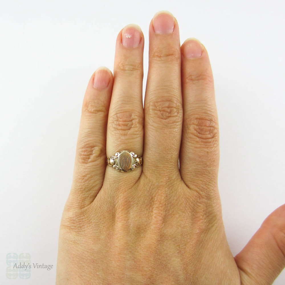 Art Deco Signet Ring by Ostby Barton, 10k Yellow Gold "RMW" Ladies Signet Ring with Engraved Flowers Circa 1920s.