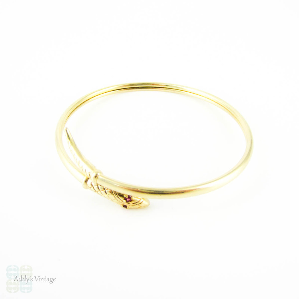 Vintage 9ct Snake Bracelet, Sprung Yellow Gold Serpent Bangle with Spinel Eyes.