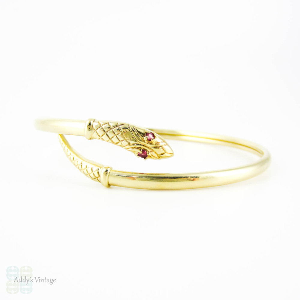 Vintage 9ct Snake Bracelet, Sprung Yellow Gold Serpent Bangle with Spinel Eyes.