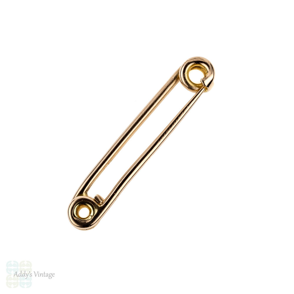 large gold safety pins