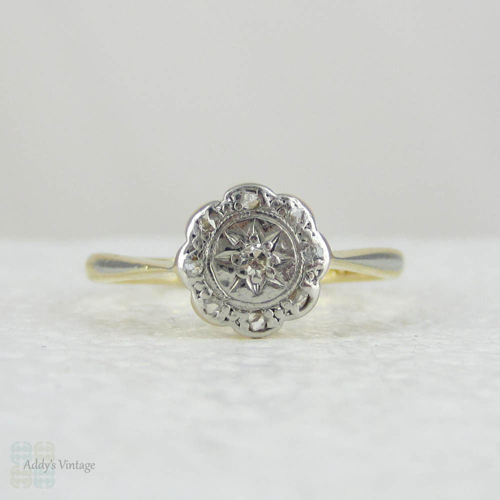 1920s Small Diamond Cluster Daisy Ring, 18 Carat Yellow Gold. Rose Cut Diamonds in Engraved Star Design.