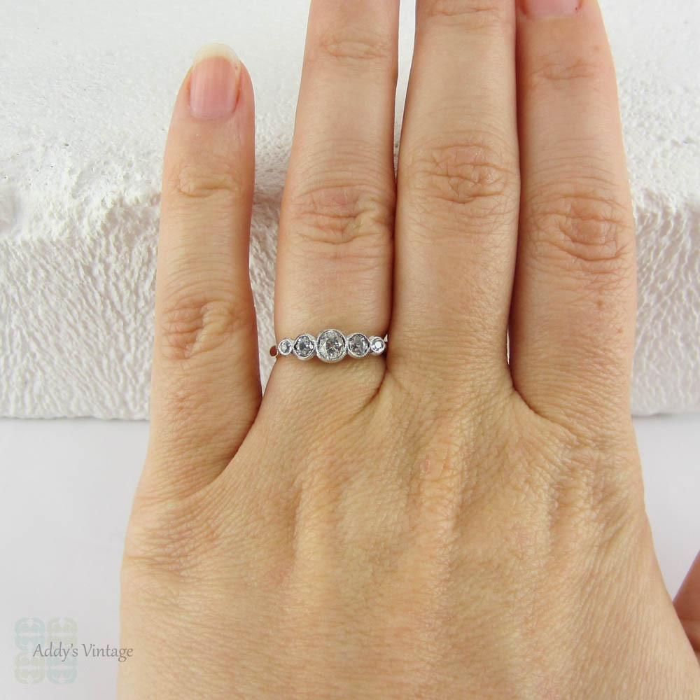 Antique Five Stone Old Mine Cut Diamond Engagement Ring. Graduated Diamonds Bezel Set in Miligrain Lined Platinum Topped 18 Carat Yellow Gold.