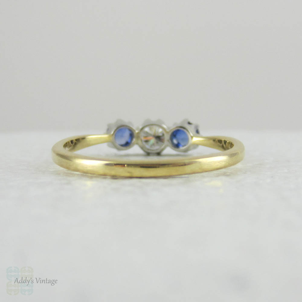 Vintage Diamond & Sapphire Three Stone Engagement Ring. Trilogy Ring with Round Brilliant Cut Diamond and Cornflower Blue Sapphire.