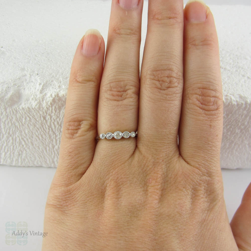 Art Deco Graduated Five Stone Diamond Ring. Half Hoop Bezel Set Diamond Engagement Ring in 18 Carat Gold with Miligrain Edges.