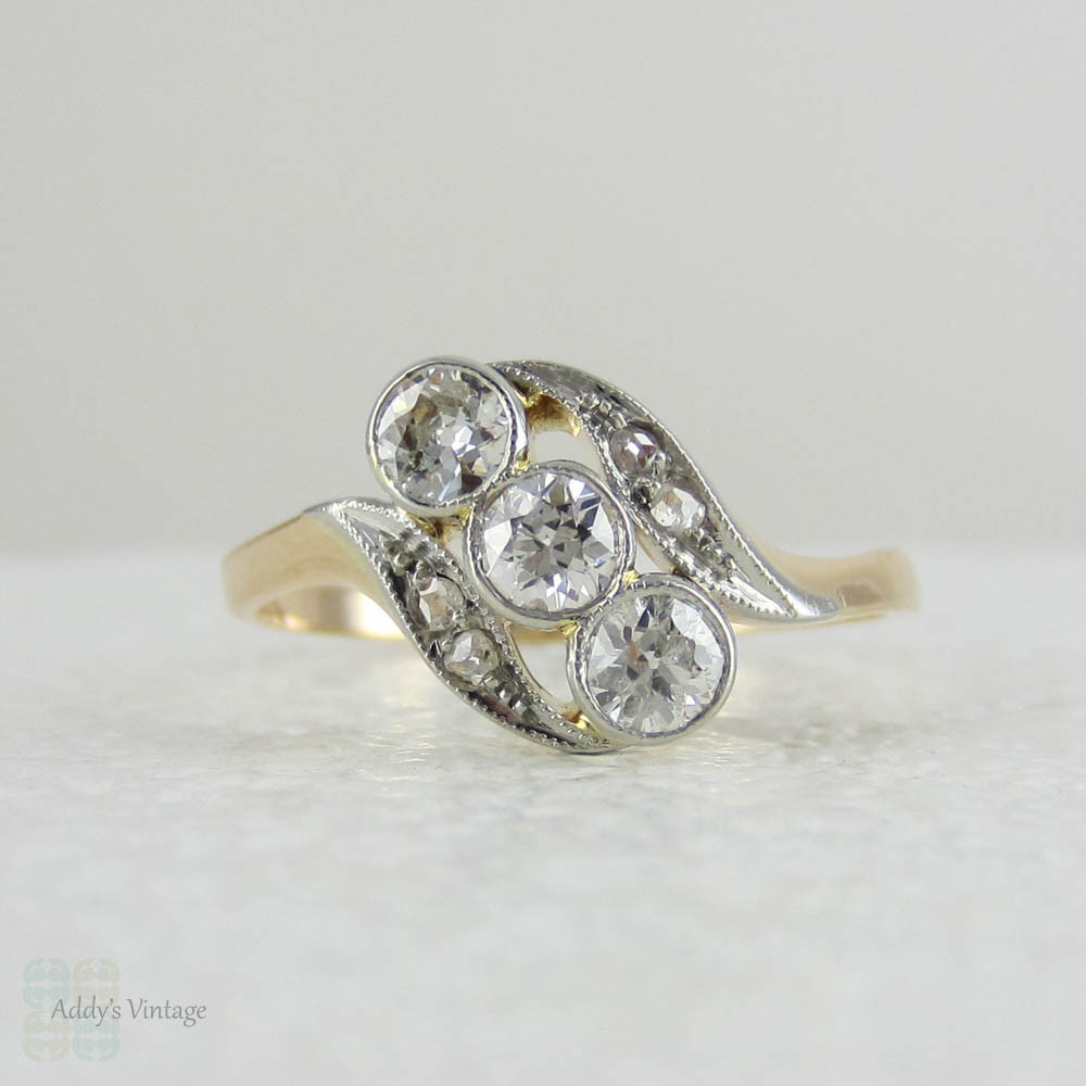 Art Nouveau Twist Shaped Diamond Engagement Ring, Old European & Rose Cut Diamonds in Bypass Style Design.