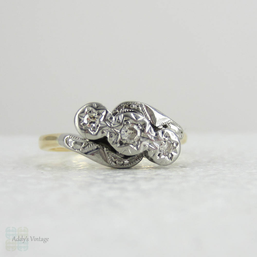 Vintage Diamond Engagement Ring, Twist Design Three Stone Trilogy Diamond Ring in 18 Carat & Platinum, 1915 - 1930s.