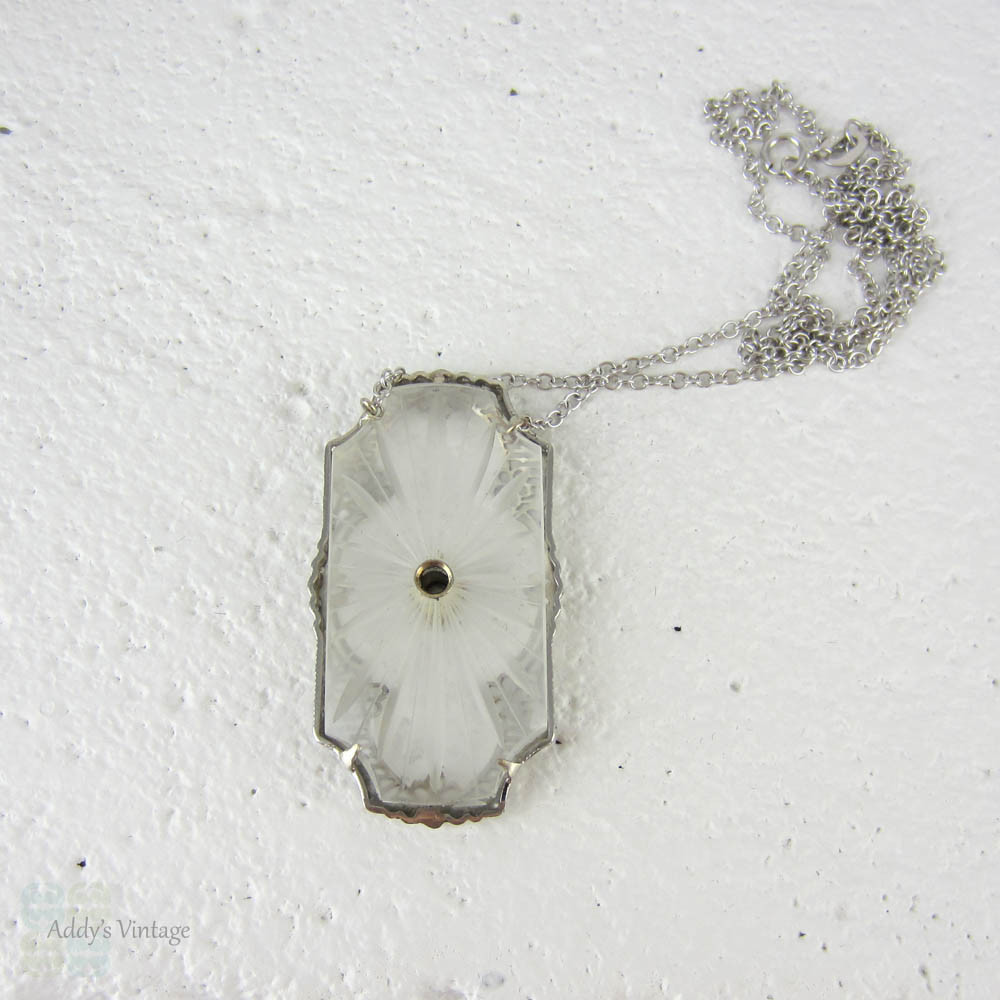 Art Deco Pendant. Camphor Glass, Diamond and White Gold Filigree Necklace. Lacey Floral Filigree with Milgrain Detail, Circa 1920s.