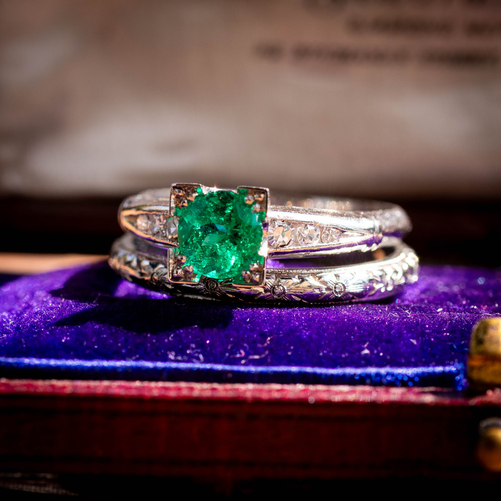Vintage Platinum 0.75ct Emerald Engagement Ring with Diamond Accents.
