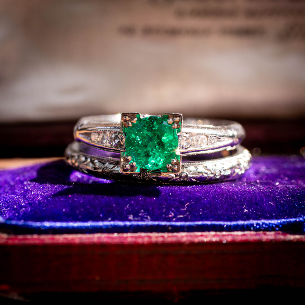 Vintage Platinum 0.75ct Emerald Engagement Ring with Diamond Accents.