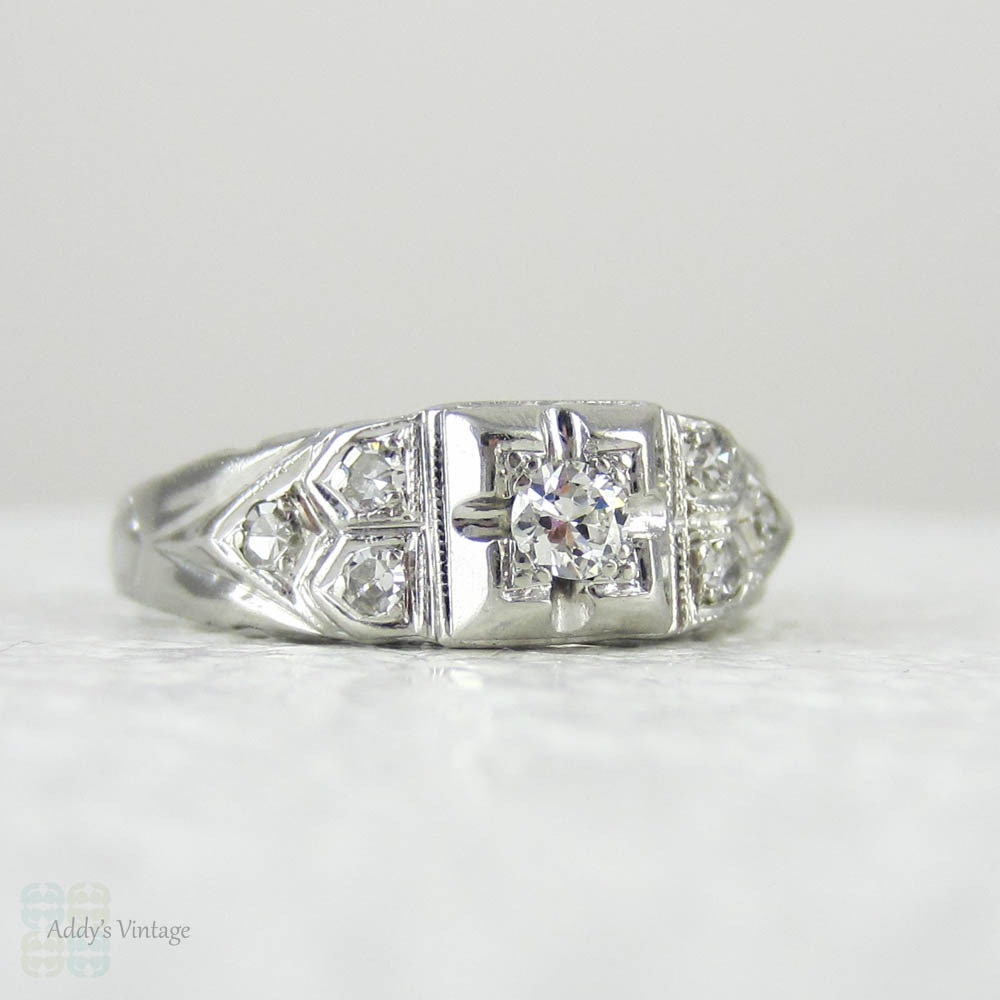 Art Deco Platinum Diamond Engagement Ring. Transitional Cut Diamond in Stepped Design Filigree Setting, 1930s.