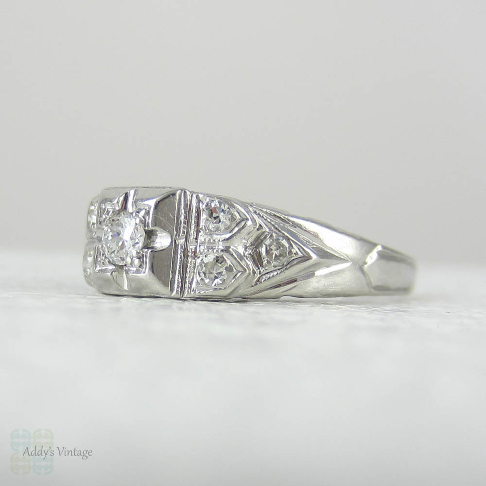 Art Deco Platinum Diamond Engagement Ring. Transitional Cut Diamond in Stepped Design Filigree Setting, 1930s.