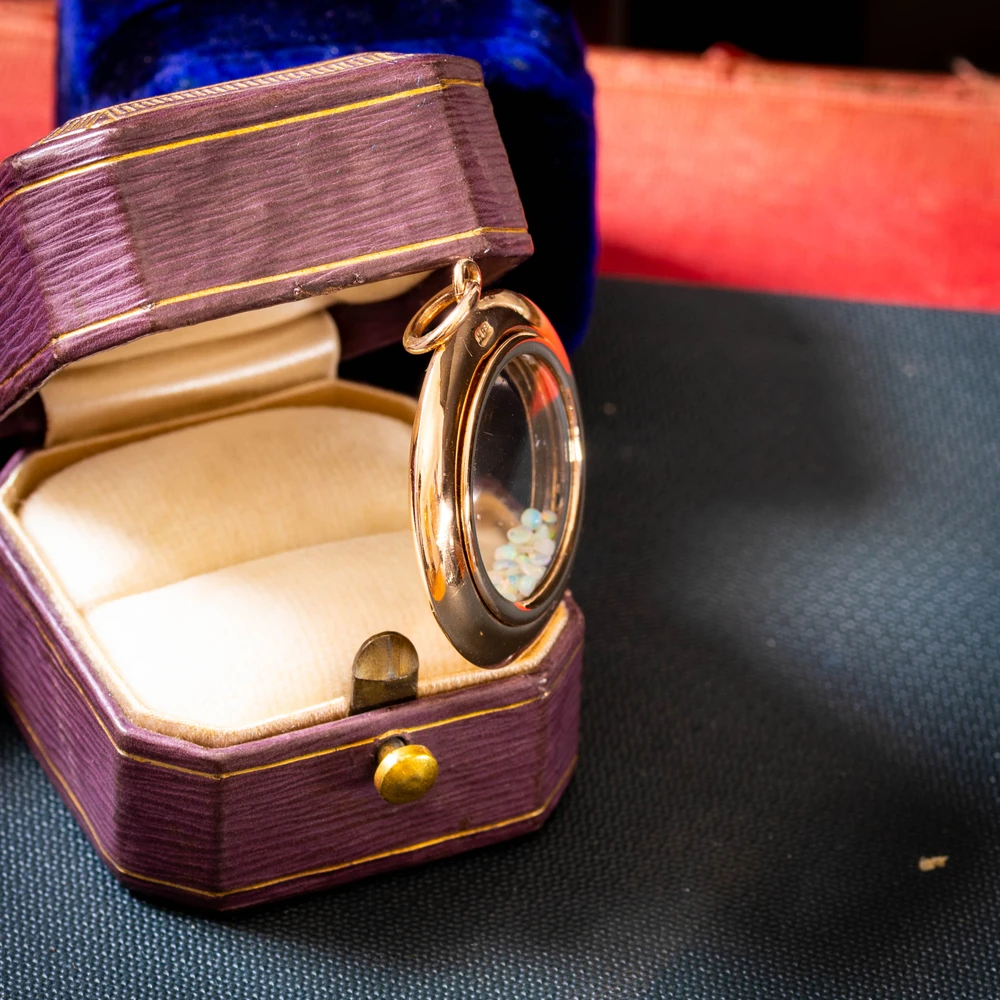 Antique Edwardian 9 Carat Gold Glass Shaker Locket with Opals.