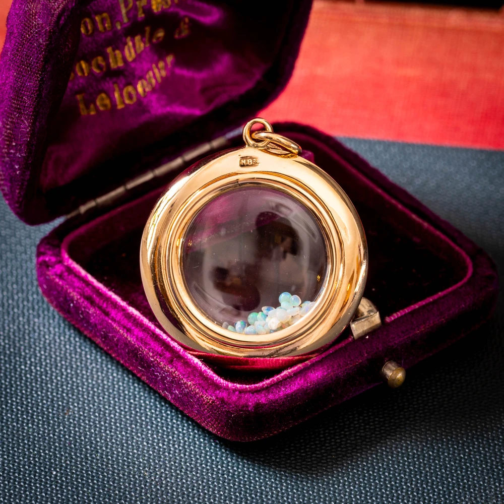Antique Edwardian 9 Carat Gold Glass Shaker Locket with Opals.