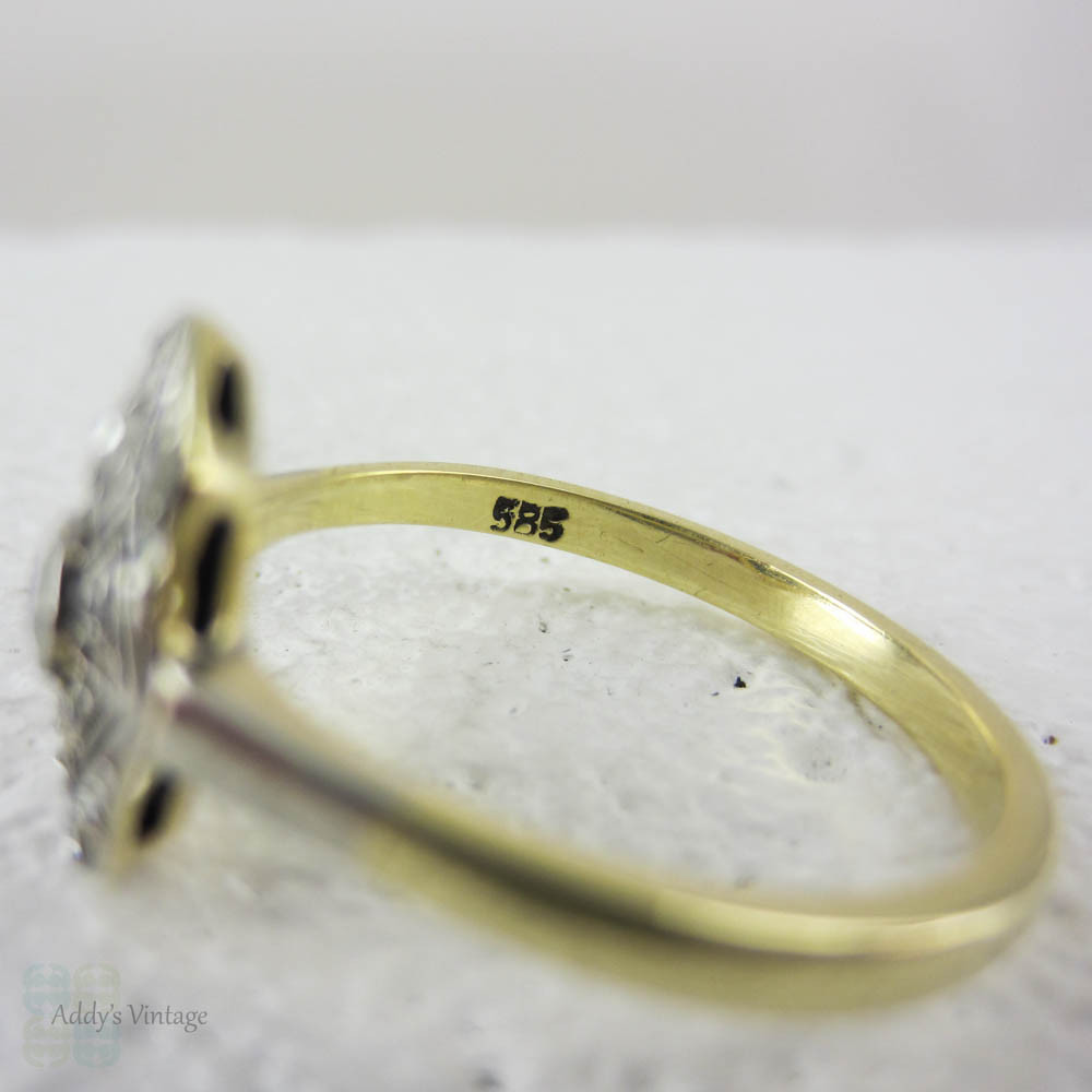 Art Deco Navette Shaped Old Mine Cut Diamond Ring with Geometric Design Pierced Filigree in Two-Tone Gold, Circa 1920s.