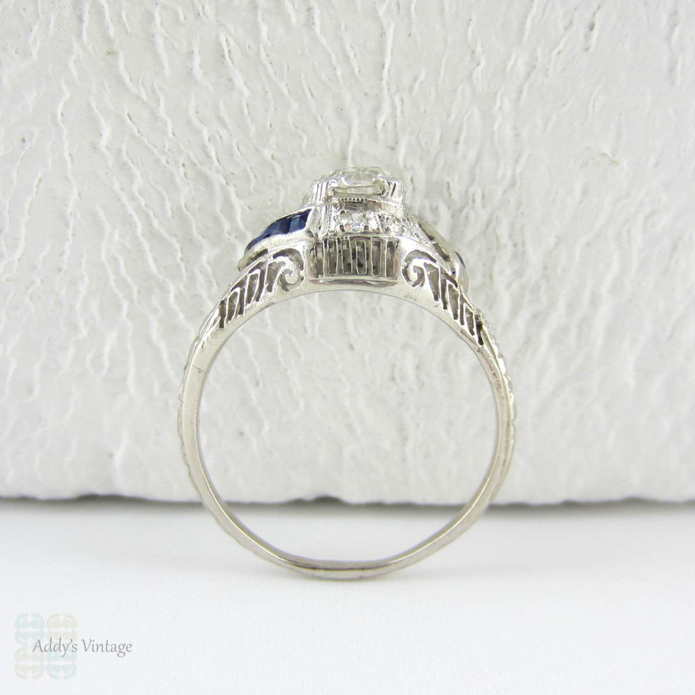 Edwardian Platinum Diamond Engagement Ring, Old European Cut Diamond in Filigree Setting with Sapphire Accents, Circa 1910s.