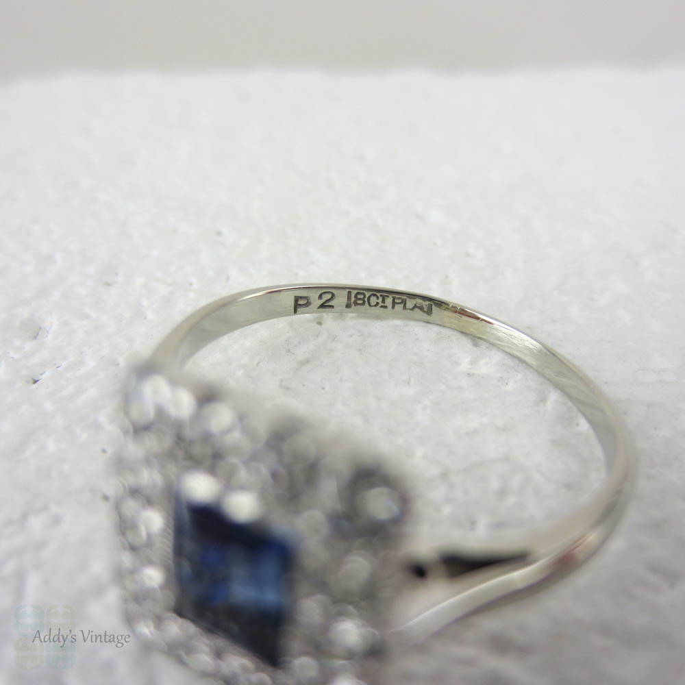 Art Deco Sapphire & Diamond Engagement Ring. Emerald Cut Blue Sapphire with Transitional Cut Diamond Halo in 18 Carat Gold & Platinum.