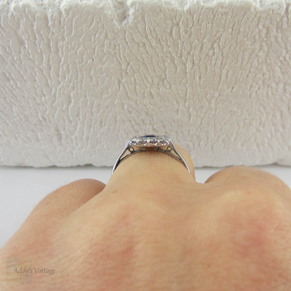 Art Deco Sapphire & Diamond Engagement Ring. Emerald Cut Blue Sapphire with Transitional Cut Diamond Halo in 18 Carat Gold & Platinum.