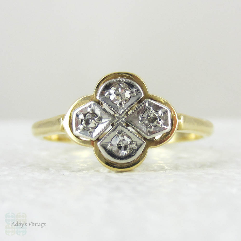 Vintage Quatrefoil Diamond Engagement Ring, Four Diamonds Set in a Clover Design, 18 Carat Gold, Circa 1920s.