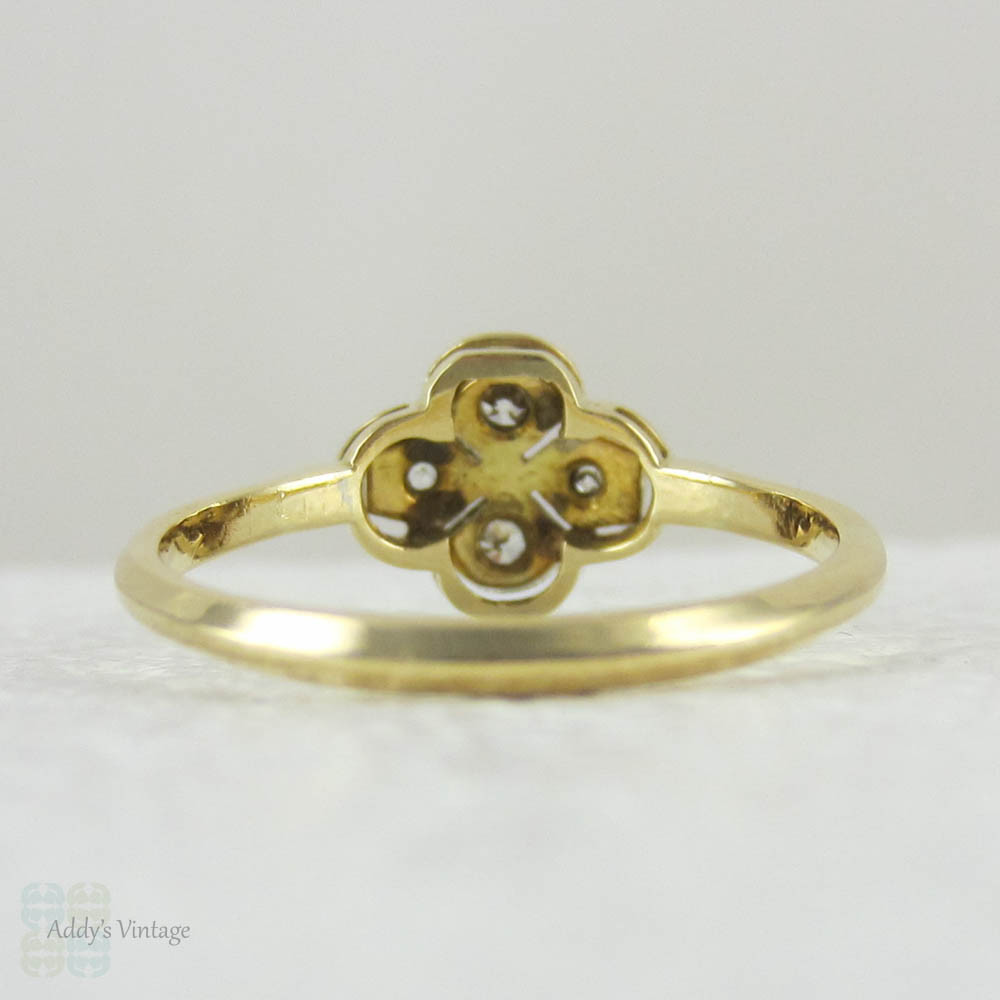 Vintage Quatrefoil Diamond Engagement Ring, Four Diamonds Set in a Clover Design, 18 Carat Gold, Circa 1920s.