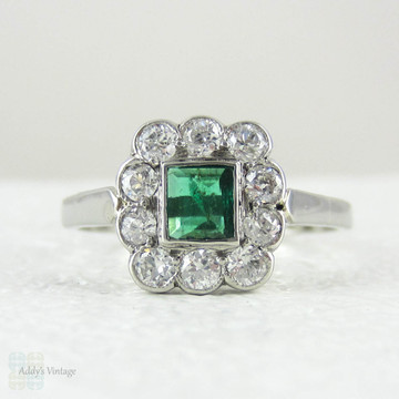 Art Deco Emerald & Diamond Engagement Ring, Platinum Set Deep Green Emerald in Diamond Halo, Circa 1930s.