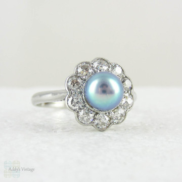 Antique Cultured Pearl Engagement Ring with Old Mine Cut Diamond Halo in Platinum, Edwardian and Diamond Cluster Ring, Circa 1900s.