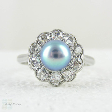 Antique Cultured Pearl Engagement Ring with Old Mine Cut Diamond Halo in Platinum, Edwardian and Diamond Cluster Ring, Circa 1900s.