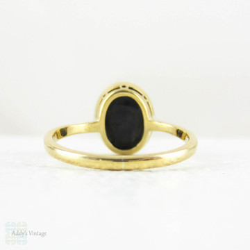 Art Nouveau Opal Doublet Ring, Black Opal Cabochon Bezel Set 18 Carat Yellow Gold Solitaire Setting, Circa 1910s.