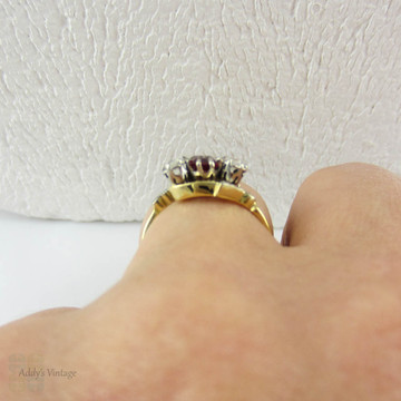 Vintage Ruby & Diamond Engagement Ring, Trilogy Ring in Bypass Twist Style. Engraved Leaf Design Setting, 18 Carat Gold, Circa 1960s.