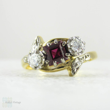 Vintage Ruby & Diamond Engagement Ring, Trilogy Ring in Bypass Twist Style. Engraved Leaf Design Setting, 18 Carat Gold, Circa 1960s.