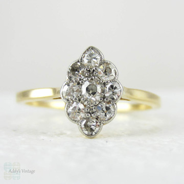 Vintage Pave Set Diamond Cluster Ring, Marquise Shape 9 Stone Old Cut Diamond Panel Ring in 18 Carat Gold, Circa 1910s.