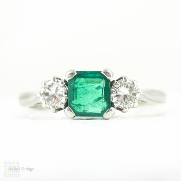 Vintage Emerald & Diamond Three Stone Engagement Ring in 18 Carat White Gold and Platinum, Circa 1940s. 