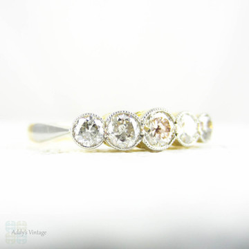 Graduated Five Stone Diamond Ring, Bezel Set Round Cut Diamonds, Milgrain Beaded Bezels. 0.57 ctw, 18 Ct & Platinum, Circa 1920s.