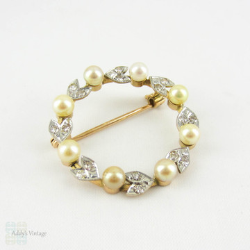 Edwardian Diamond & Pearl Brooch in 18ct Gold and Platinum. Wreath Circle Pin with Diamond Leaf Design and Miligrain, Circa 1900s.