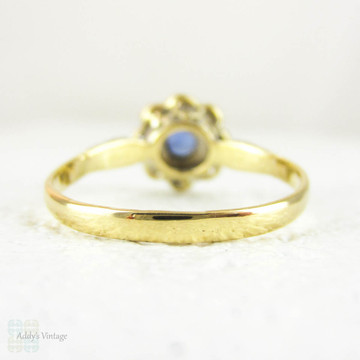 Sapphire & Diamond Daisy Engagement Ring, Blue Sapphire in Floral Shape Diamond Halo with Milgrain. Circa 1930s, 18ct & Platinum.