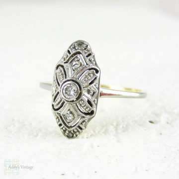 Art Deco German Diamond Ring, Pierced Filigree Plaque Shape Oblong Panel Ring in 14 Carat Gold & Platinum, Circa 1930s.