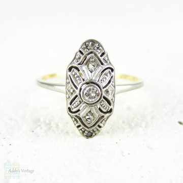 Art Deco German Diamond Ring, Pierced Filigree Plaque Shape Oblong Panel Ring in 14 Carat Gold & Platinum, Circa 1930s.
