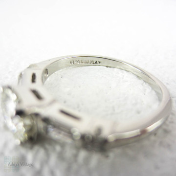 Vintage Diamond Engagement Ring, Early Round Brilliant Cut Diamond & Straight Baguettes. Stamped Platinum Setting, 1 ctw, Circa 1930s.