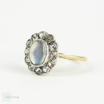 Vintage Moonstone & Paste Halo Ring, Oval Cabochon Moonstone with Diamond Paste Halo in 9 Carat Yellow Gold in Sterling Silver, Circa 1930s.