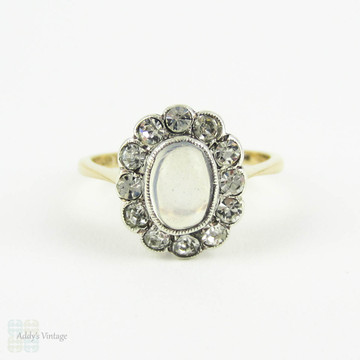 Vintage Moonstone & Paste Halo Ring, Oval Cabochon Moonstone with Diamond Paste Halo in 9 Carat Yellow Gold in Sterling Silver, Circa 1930s.