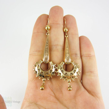 Antique Victorian Drop Earrings, Long 9 Carat Gold Etruscan Revival Dangle Earrings with Sunburst Engraved Design. Circa 1870s.
