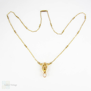 BALANCE. Art Nouveau 15ct Gold Necklace, Fancy Trombone Link Chain with Large Knot Design Pendant and Dog Clip for Pendant, Circa 1910s.