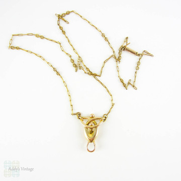 BALANCE. Art Nouveau 15ct Gold Necklace, Fancy Trombone Link Chain with Large Knot Design Pendant and Dog Clip for Pendant, Circa 1910s.