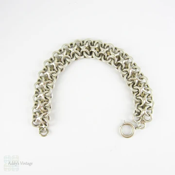 Vintage French Bracelet, Sterling Silver Alternating Beaded Texture & Shiny Figure 8 Links with 9 Carat Rose Gold Accents. Circa 1940s.