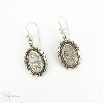 Victorian Aesthetic Movement Earrings, Sterling Silver Engraved Floral Foliate Design Oval Shape Dangle Earrings, Circa 1880s.