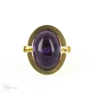 Modernist Amethyst Cocktail Ring, Royal Purple Cabochon Cut Amethyst in 8 Carat Gold Convex Split Shape Setting. Circa 1960s.