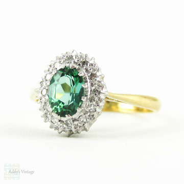 Vintage Tourmanline Ring, Green Oval Cut Tourmaline with Diamond Halo. Mid Century Cluster Ring in 18 Carat Gold & Platinum.